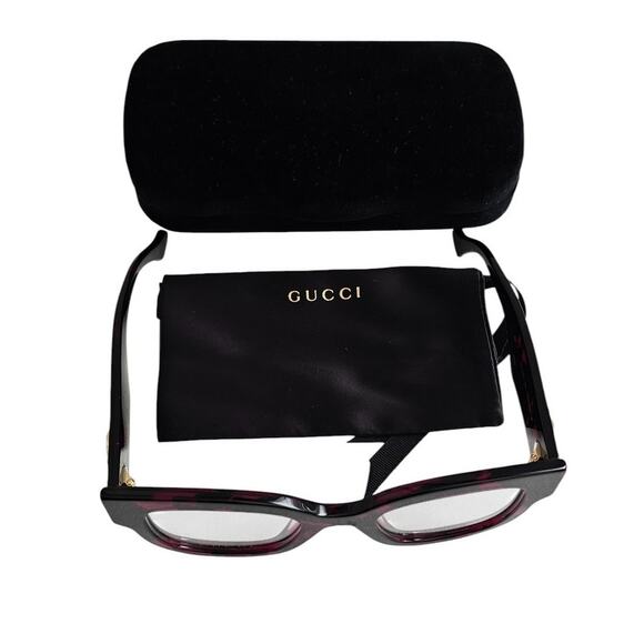 Gucci GG1423O cat-eye eyeglasses in a fuchsia havana color main image 8